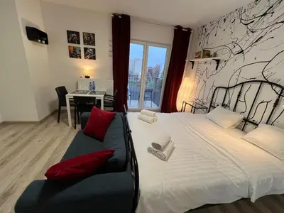 Łóżko lub łóżka w pokoju w obiekcie Wileńska Express Apartment