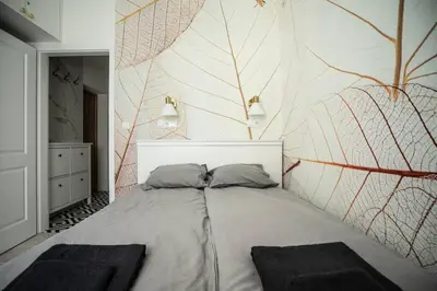 Łóżko lub łóżka w pokoju w obiekcie Apartment Marszalkowska Premium Warsaw City Center