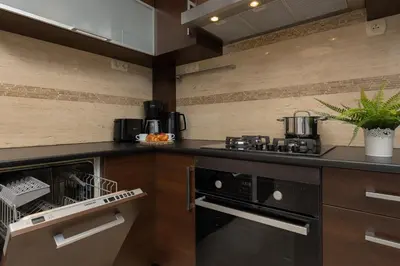 Kuchnia lub aneks kuchenny w obiekcie Family Apartment near PGE Narodowy by Noclegi Renters