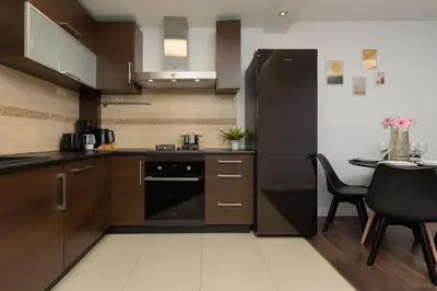 Kuchnia lub aneks kuchenny w obiekcie Family Apartment near PGE Narodowy by Noclegi Renters