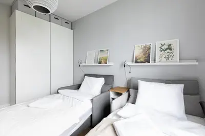 Łóżko lub łóżka w pokoju w obiekcie P&O Apartments Rembrandta - Targówek
