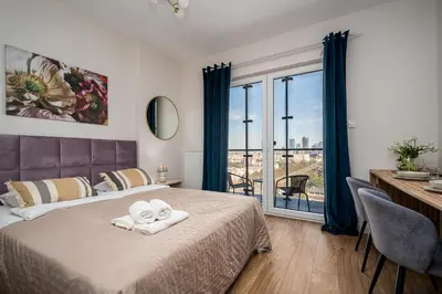 Łóżko lub łóżka w pokoju w obiekcie Kasprzaka 29 Wola Tower C By Perfect Apart