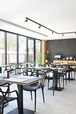 Restauracja lub miejsce do jedzenia w obiekcie Hotel Parrot