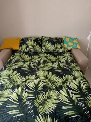 Łóżko lub łóżka w pokoju w obiekcie Złoty apartament Bokserska