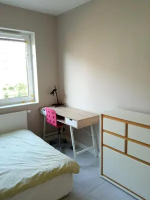 Łóżko lub łóżka w pokoju w obiekcie Złoty apartament Bokserska