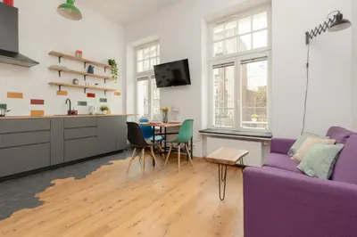 Telewizja i/lub zestaw kina domowego w obiekcie Apartment with Balcony Warsaw's Praga by Noclegi Renters