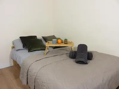 Łóżko lub łóżka w pokoju w obiekcie Apartament Dolny Mokotów