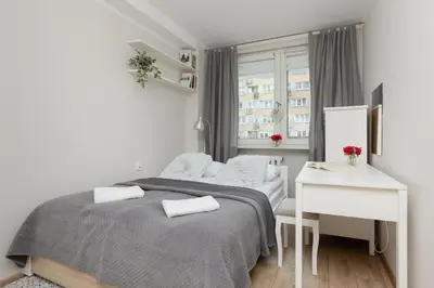 Łóżko lub łóżka w pokoju w obiekcie Pet-Friendly Apartment Pańska with AC by Noclegi Renters
