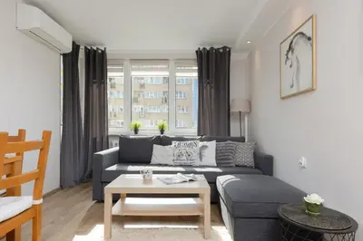 Część wypoczynkowa w obiekcie Pet-Friendly Apartment Pańska with AC by Noclegi Renters