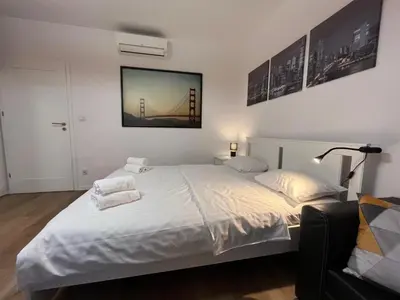 Łóżko lub łóżka w pokoju w obiekcie Targowa Charming Studio