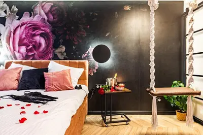 Łóżko lub łóżka w pokoju w obiekcie Secret Garden Apartment