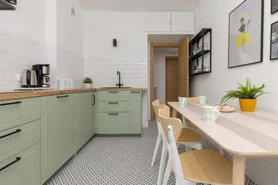 Kuchnia lub aneks kuchenny w obiekcie Tasteful Apartment in Warsaw City Center by Noclegi Renters