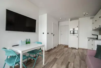 Telewizja i/lub zestaw kina domowego w obiekcie Unique Studio with stunning view & Netflix