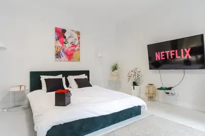 Łóżko lub łóżka w pokoju w obiekcie Lumina Deluxe Warsaw