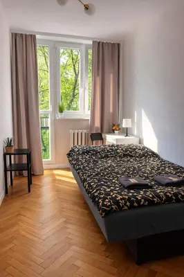 Łóżko lub łóżka w pokoju w obiekcie Warsaw Center ClassicRooms