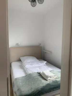 Łóżko lub łóżka w pokoju w obiekcie Forest Apart III