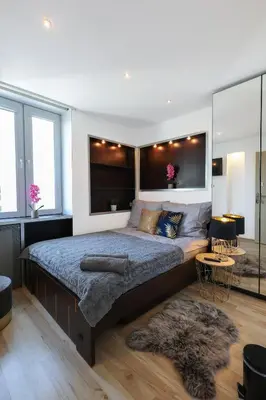 Łóżko lub łóżka w pokoju w obiekcie ClickTheFlat Chłodna Center Apart Rooms