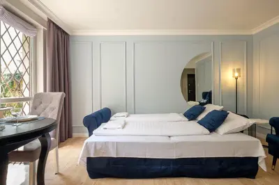 Łóżko lub łóżka w pokoju w obiekcie Labo Apartment Sady Żoliborskie