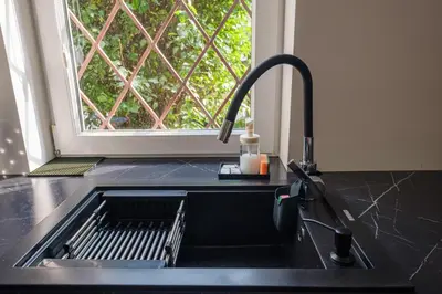 Kuchnia lub aneks kuchenny w obiekcie Labo Apartment Sady Żoliborskie