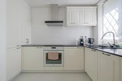Kuchnia lub aneks kuchenny w obiekcie Labo Apartment Sady Żoliborskie