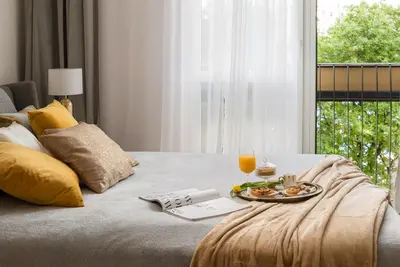 Łóżko lub łóżka w pokoju w obiekcie Gold Premium Central Suite 950 m to Central Station parking