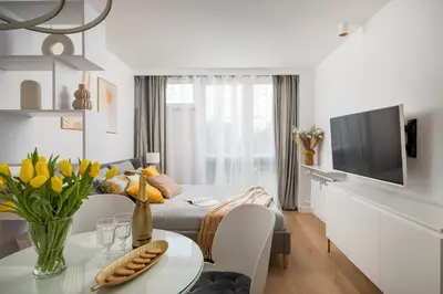 Telewizja i/lub zestaw kina domowego w obiekcie Gold Premium Central Suite 950 m to Central Station parking