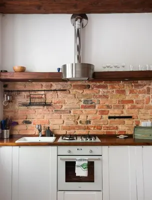 Kuchnia lub aneks kuchenny w obiekcie Głogowa Bricks Apartment by BookingHost