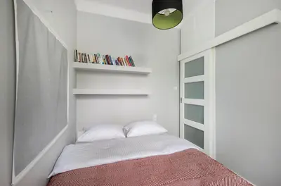 Łóżko lub łóżka w pokoju w obiekcie Głogowa Bricks Apartment by BookingHost