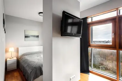 Łóżko lub łóżka w pokoju w obiekcie Vorto Apartament 3 - Warszawa Centrum
