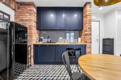 Kuchnia lub aneks kuchenny w obiekcie Vistula Loft Blue Apartment by BookingHost