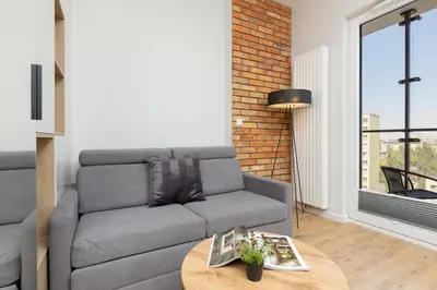 Część wypoczynkowa w obiekcie Wola Business Studios Kasprzaka by Noclegi Renters