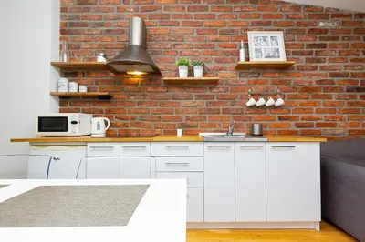 Kuchnia lub aneks kuchenny w obiekcie Warsaw City Centre Apartment Poznanska with Air-Conditioning by Noclegi Renters