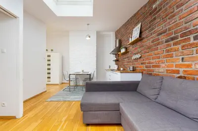 Część wypoczynkowa w obiekcie Warsaw City Centre Apartment Poznanska with Air-Conditioning by Noclegi Renters