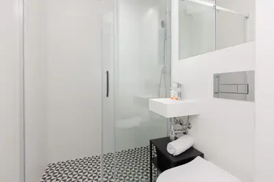 Łazienka w obiekcie Cosy Dream City Center Apartment by Noclegi Renters