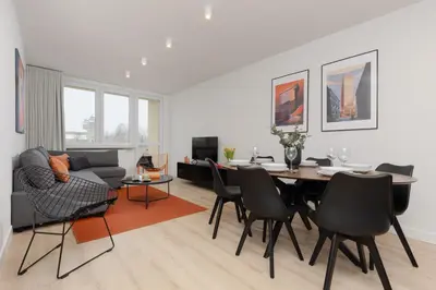 Część wypoczynkowa w obiekcie Cosy Dream City Center Apartment by Noclegi Renters