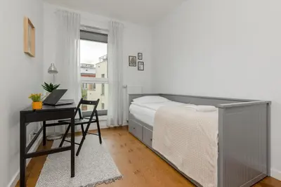 Łóżko lub łóżka w pokoju w obiekcie Modern Apartment Stalowa 2 bedrooms & Parking by Noclegi Renters