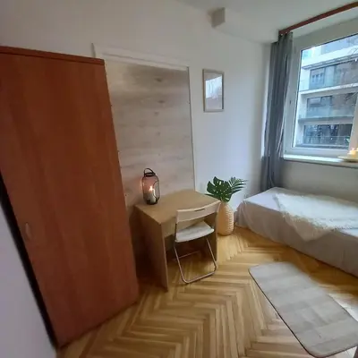 Łóżko lub łóżka w pokoju w obiekcie Regem Pokoje Złota
