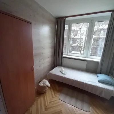 Łóżko lub łóżka w pokoju w obiekcie Regem Pokoje Złota
