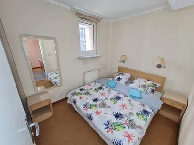 Łóżko lub łóżka w pokoju w obiekcie 10Q - Z6 Apartment 305