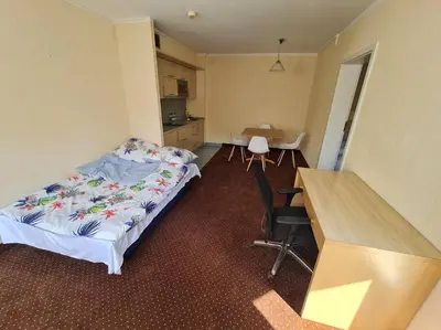 Łóżko lub łóżka w pokoju w obiekcie 10Q - Z6 Apartment 201