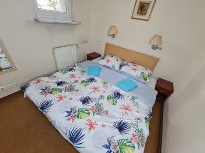 Łóżko lub łóżka w pokoju w obiekcie 10Q - Z6 Apartment 205