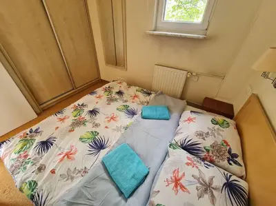 Łóżko lub łóżka w pokoju w obiekcie 10Q - Z6 Apartment 205