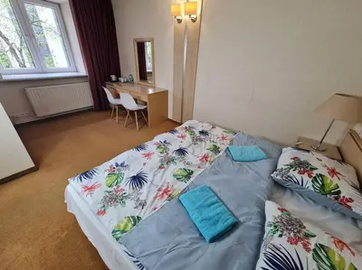 Łóżko lub łóżka w pokoju w obiekcie 10Q - Z6 Apartment 206
