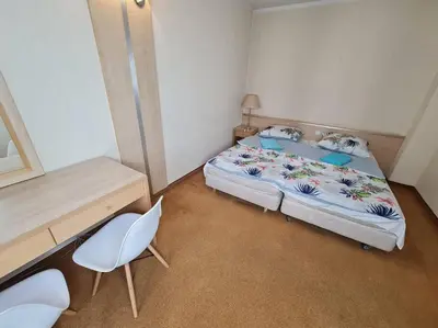 Łóżko lub łóżka w pokoju w obiekcie 10Q - Z6 Apartment 206