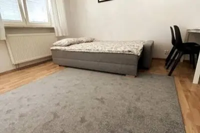 Łóżko lub łóżka w pokoju w obiekcie Apartment Kabacki Dukt