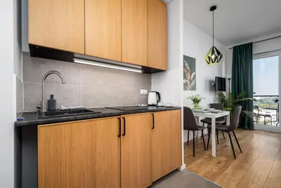 Kuchnia lub aneks kuchenny w obiekcie Kasprzaka 31 Free parking By Perfect Apart