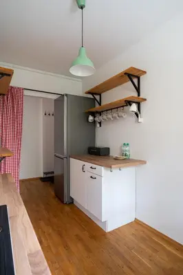 Kuchnia lub aneks kuchenny w obiekcie Woronicza 42 Standard Apartment by BookingHost