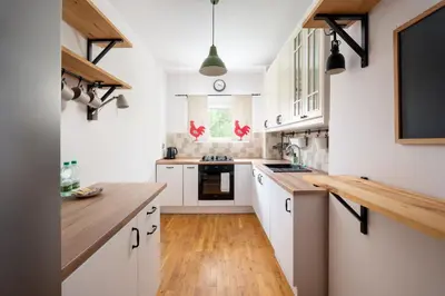 Kuchnia lub aneks kuchenny w obiekcie Woronicza 42 Standard Apartment by BookingHost