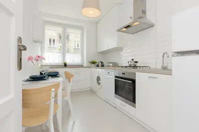 Kuchnia lub aneks kuchenny w obiekcie Bałuckiego Apartment Stary Mokotów Warsaw by Noclegi Renters