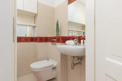 Łazienka w obiekcie Bałuckiego Apartment Stary Mokotów Warsaw by Noclegi Renters
